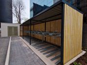 Fabricated Steel Bike Shelter With Vertical Racks in Mesh Cage Finish